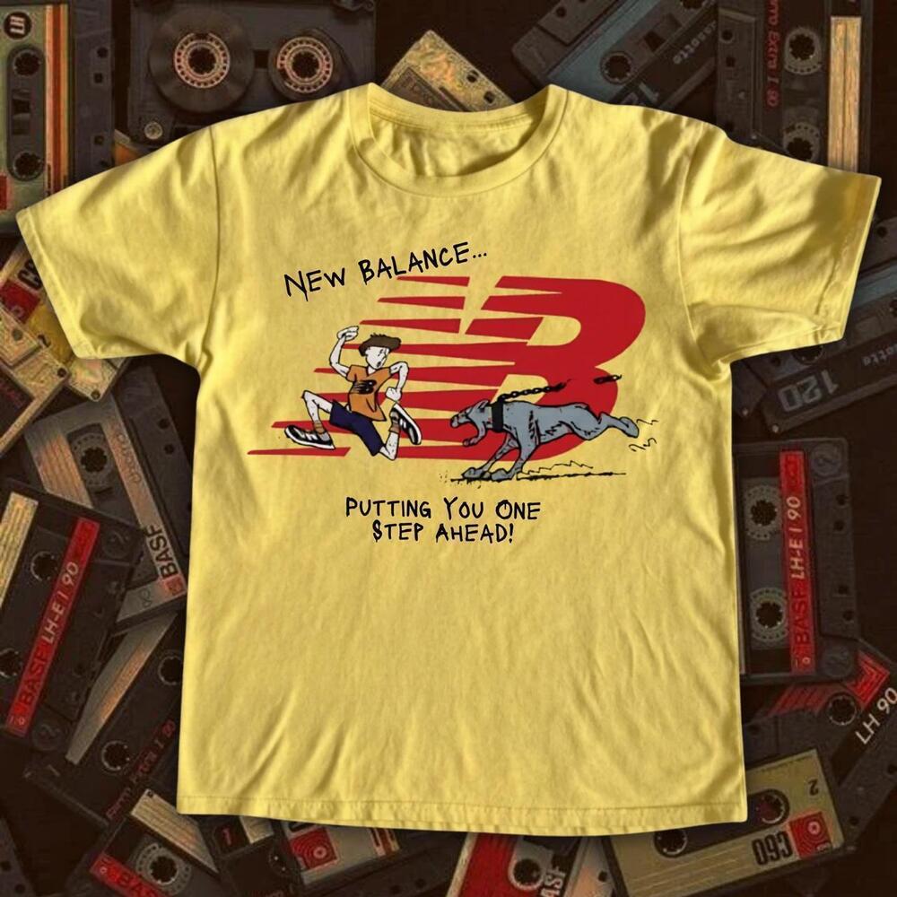 Yellow New Balance Tee With A Fun Graphic